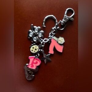 2013 Disney parks key fob. NWOT. 7 13 clover dice